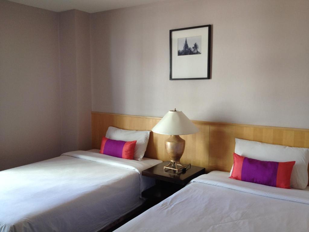 Gardengrove Suites Bangkok Rum bild