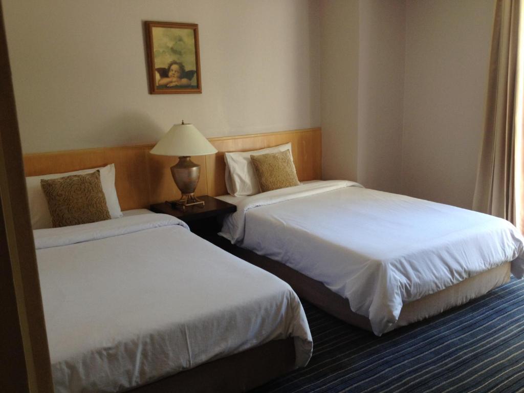 Gardengrove Suites Bangkok Rum bild