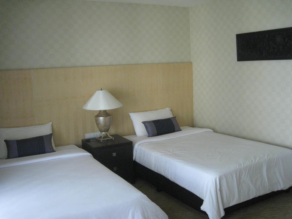 Gardengrove Suites Bangkok Rum bild